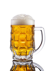 Mug of beer isolated on white with frost bubbles on mug surface.