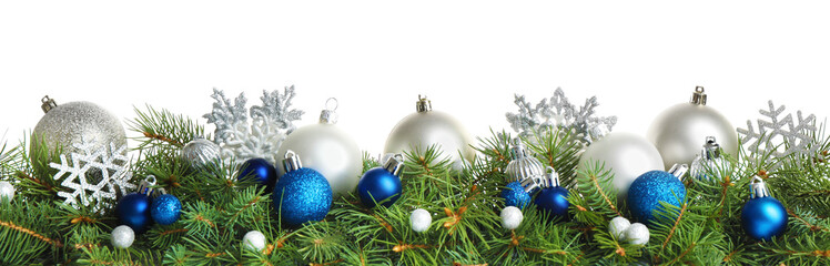 Fototapeta na wymiar Fir tree branches with Christmas decoration on white background