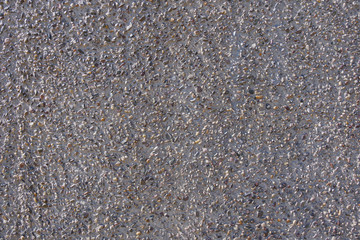 Cast mixture size and colour of pebble stone flooring or wall panel facade.