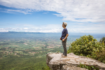 Tourist woman on Cliff view in Phu Lan Kha, Thailand.