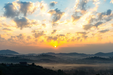 The moving flow of the mist or foggy in between the hills of mountains