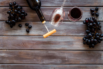 Testing wine concept. Top view dark wooden background copy space