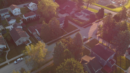 Aerial view of residential houses at summer. American neighborhood, suburb.  Real estate, drone...