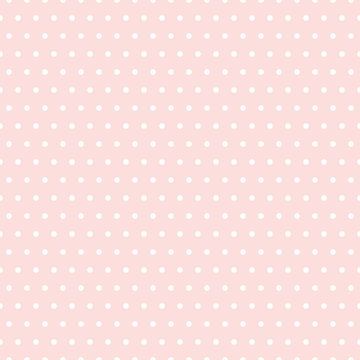 Pink and white seamless polka dot pattern
