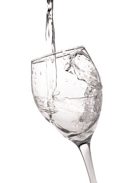 Water being poured into a goblet