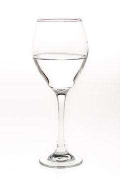 Water being poured into a goblet