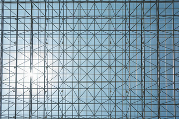 Indoor metal mesh transparent glass roof sky background