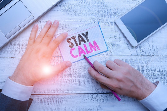 Writing note showing Stay Calm. Business concept for Maintain in a state of motion smoothly even under pressure