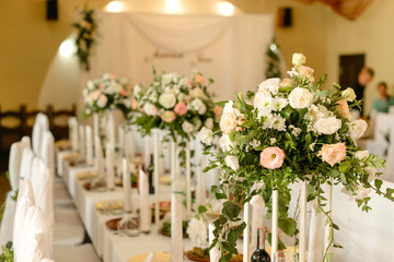 Beautiful flowers on table in wedding day. Rustic style wedding table decoration and setting
