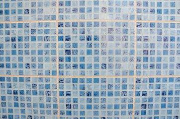 Fototapeta premium blue tile for background. Part of the wall.