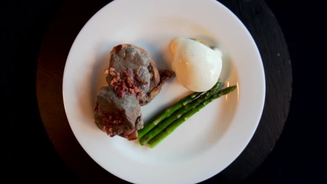 A delicious dish of filet mignon turns in a cenital plane