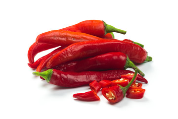 Closeup top view red chili pepper with sliced on white background, raw food ingredient concept