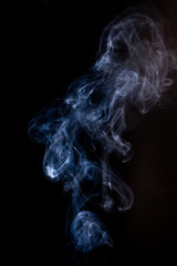 Fototapeta premium Smoke motion on black background.