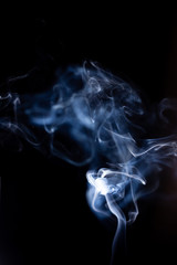 Smoke motion on black background.