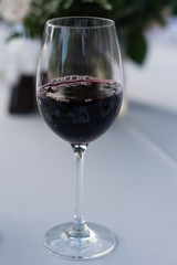 Elegant Red Wine Glass on Table