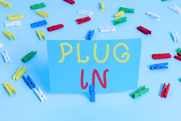 Handwriting text Plug In. Conceptual photo putting device into electricity to turn it on Power it...