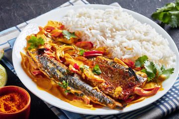 Grilled Saba yellow curry on a plate