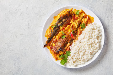 Panang curry with Grilled Saba fish on white plate