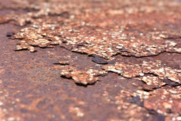 But the old paint pattern formed on the surface of the steel