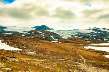 Mountains with snow glaciers. Road Sognefjellet, Norway