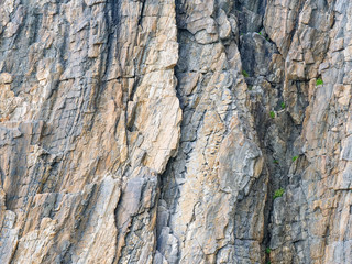 Background of stone wall texture rough rock surface