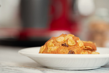 Cookies in a plate on kitchen counter close up