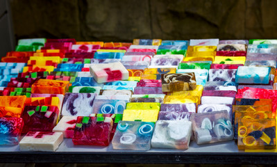 colorful pieces of soap on a counter in an oriental bazaar