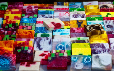 Fototapeta na wymiar colorful pieces of soap on a counter in an oriental bazaar