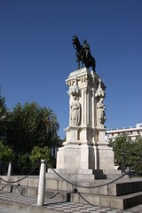 Fototapeta na wymiar Monument to King Saint Ferdinand at New Square (Spanish: Plaza Nueva) in Seville, Spain.