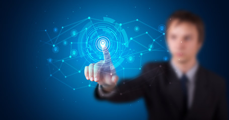 Man touching hologram screen displaying keys and locks