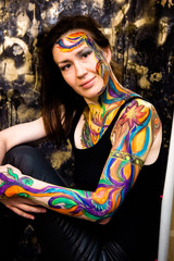 Beautiful girl, woman, body art, drawn drawing on the face close-up