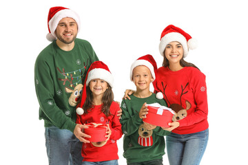 Happy family with Christmas gifts on white background