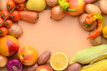 Sheet of paper with many healthy vegetables and fruits on color background