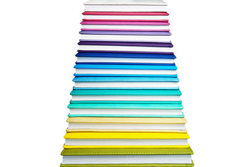 Books with Colorful Book Covers Stacked in a Pile, Isolated on White Background. Bright Education or Business Template with Copy Space