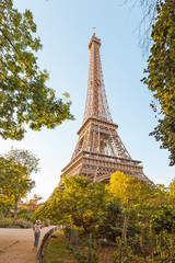 View of majestic Eiffel tower from the park