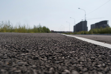 New asphalt road. Empty asphalt road.