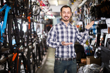 Fototapeta na wymiar Male customer in bike shop