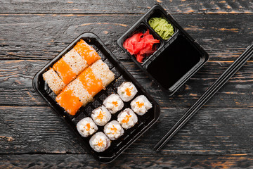 Delicious rolls with fish and cheese	