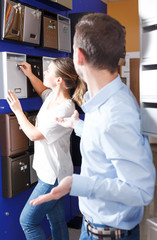 Couple choosing mailbox