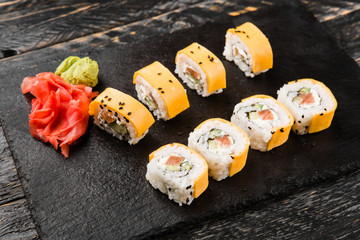 Delicious rolls with fish and cheese	