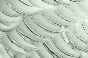 Abstract brush strokes toned mint tranquil green background.