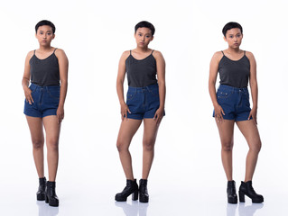 Fashion Young tanned skin Asian Woman short fringe hair wear Gray vast short jean and high platform...