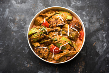 Undhiyu is a Gujarati mixed vegetable dish, specialty of Surat, India. Served in a bowl with or...