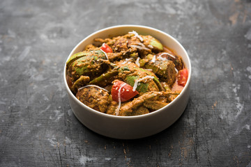 Undhiyu is a Gujarati mixed vegetable dish, specialty of Surat, India. Served in a bowl with or without poori