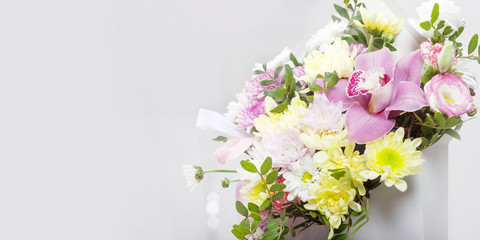 Bouquet of flowers - orchids and chrysanthemums. Copy space