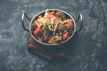 Undhiyu is a Gujarati mixed vegetable dish, specialty of Surat, India. Served in a bowl with or without poori