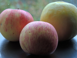 apples on black background