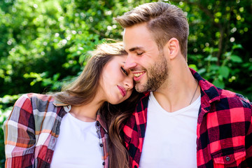 Fototapeta premium Fall in love. Pure feelings. Romantic date concept. Beautiful people. Happy together. Couple in love. Enjoying each other. Cuddling with darling. Man hipster and pretty woman in love. Summer vacation