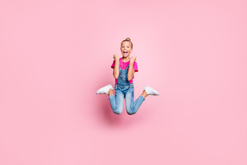 Full length body size photo of trendy cheerful cute nice girl shouting with victory jumping up...