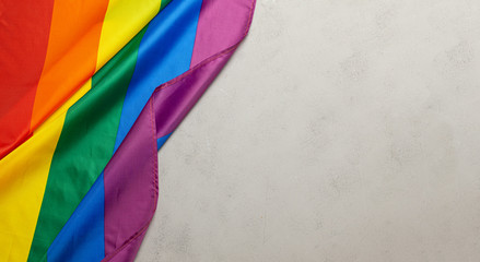 LGBT Pride Rainbow Flag. Grey background - obrazy, fototapety, plakaty